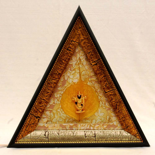Crystal Balaji on a sacred golden leaf encased in a triangular frame, designed for elegant wall decor.