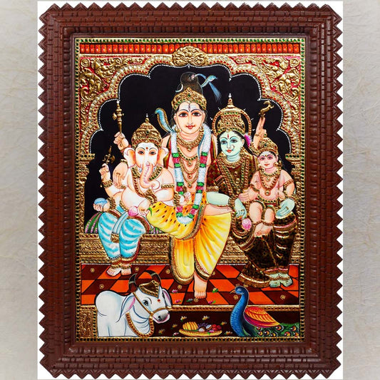 Tanjore painting of the Shiva Family with Lord Shiva, Parvati, Ganesha, Murugan, Nandi, and peacock, embellished with gold foil and vibrant colors.