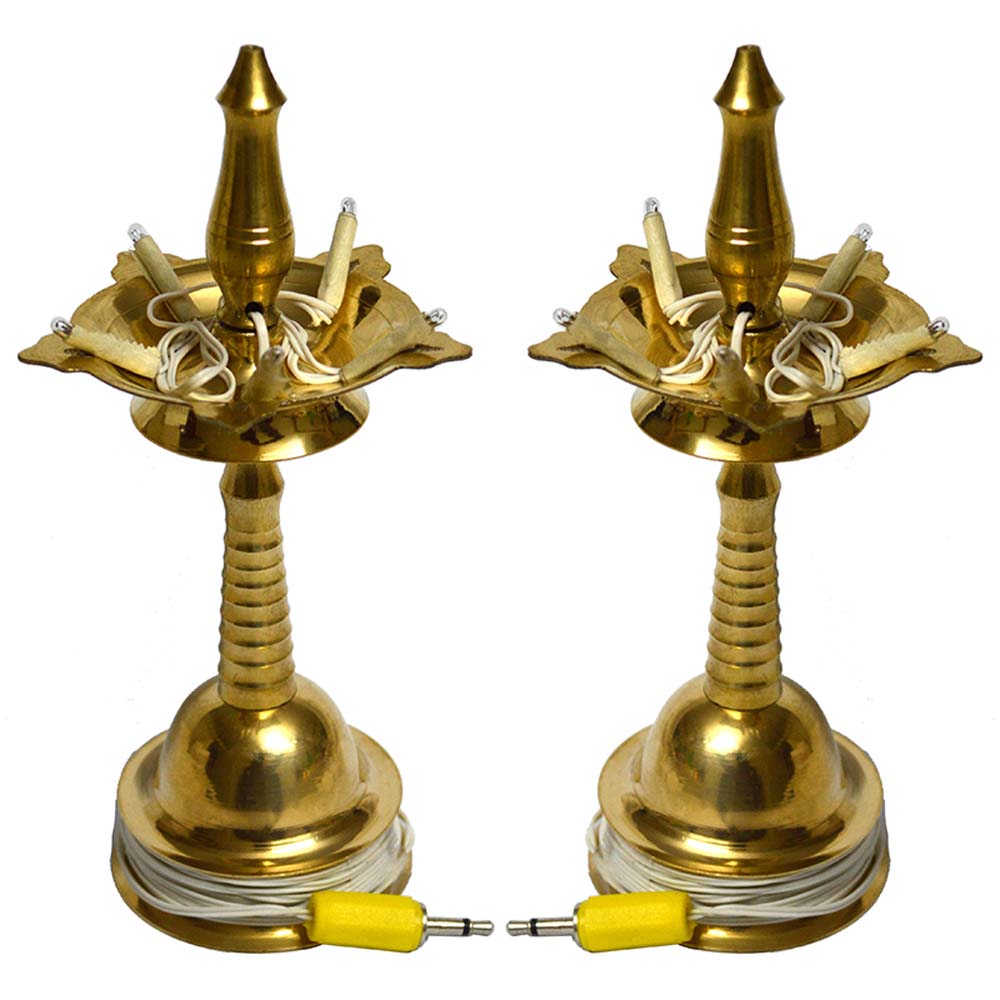 Set of traditional brass electrical lamps with classic South Indian design and electrical fittings.