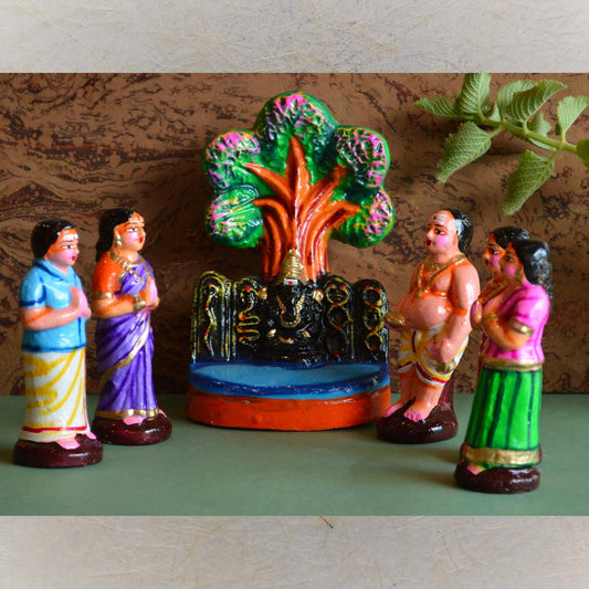 Navarathri Golu Arasamara Ganesha Set with a sacred tree, Lord Ganesha, and vibrant figurines of devotees for festive decor.