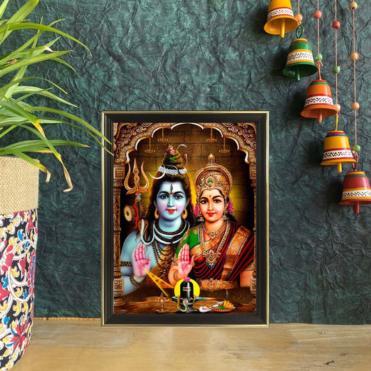 Framed artwork of Lord Shiva and Goddess Parvati with temple arch and Shiva Lingam in a serene, divine setting.