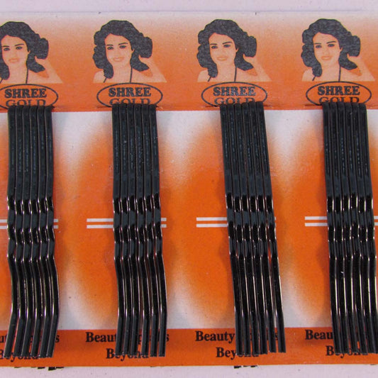 Set of 12 medium zigzag black hairpins on an orange packaging card for secure hairstyling
